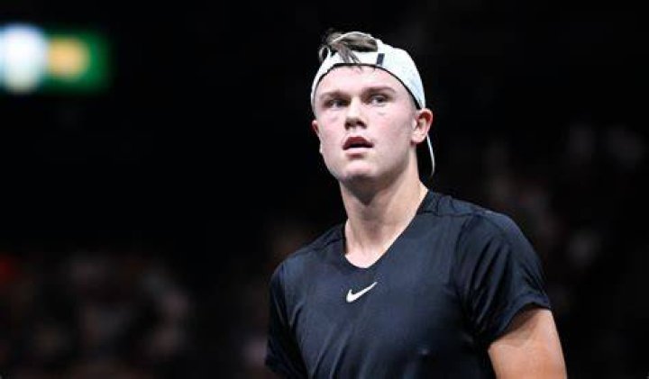 Holger Rune looks up during his match