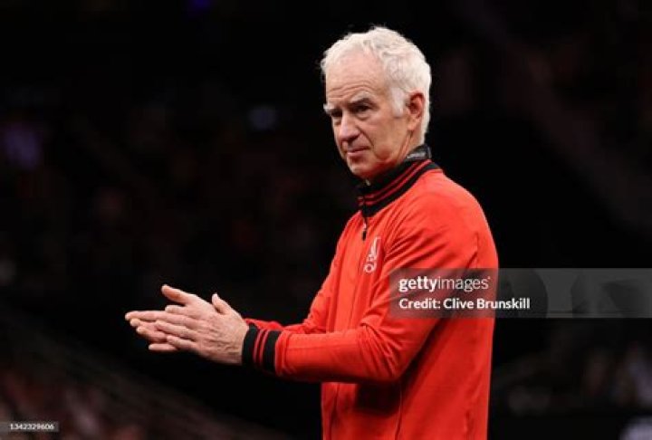 John McEnroe looks on